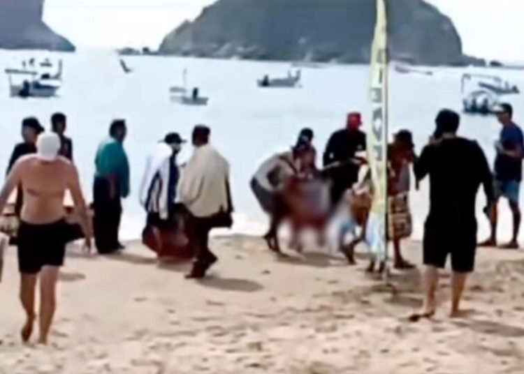 Trágico Incidente en Playa Melaque: Tiburón Ataca a Turista